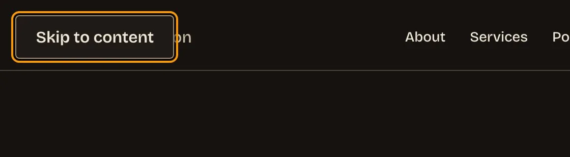 The same masthead with a visible Skip to content link in the top left corner, ringed in orange.